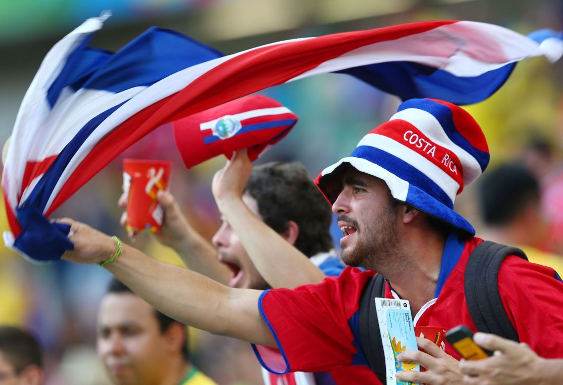 A Costa Rica fan enjoys the atmosphere of Pernambuco Arena in Recife, Brazil, before the game between Costa Rica and Greece.