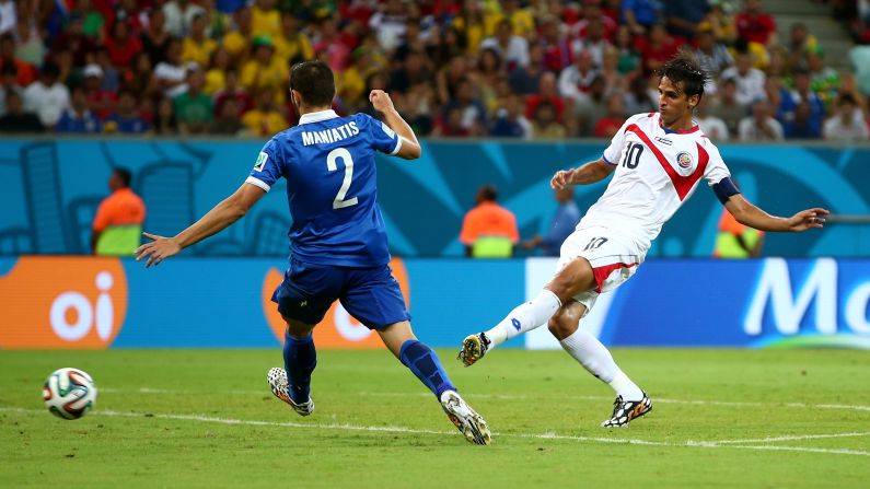 Bryan Ruiz of Costa Rica scores his team's goal against Greece.