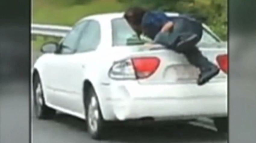 dnt man on trunk of car _00004821.jpg