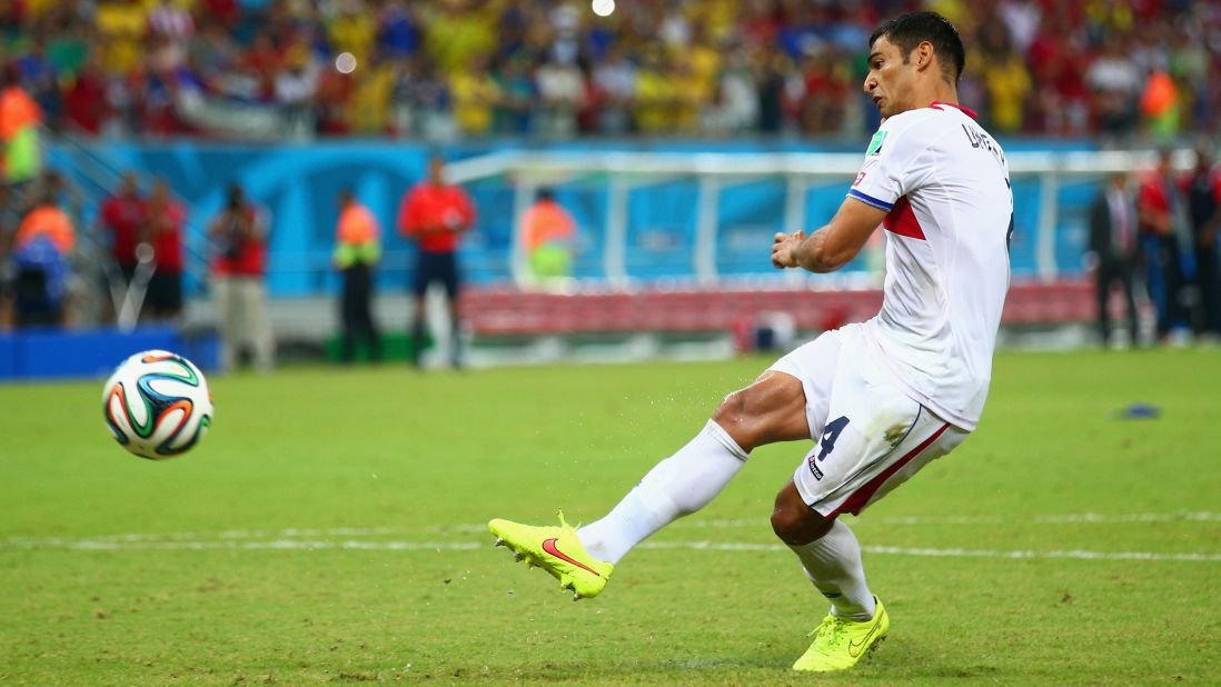 Michael Umana of Costa Rica shoots and scores a penalty kick to defeat Greece.