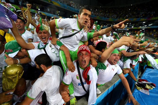Algeria fans in Curitiba, Brazil, celebrate after a 1-1 draw with Russia on Thursday, June 26, put their team through to the next round of the World Cup.
