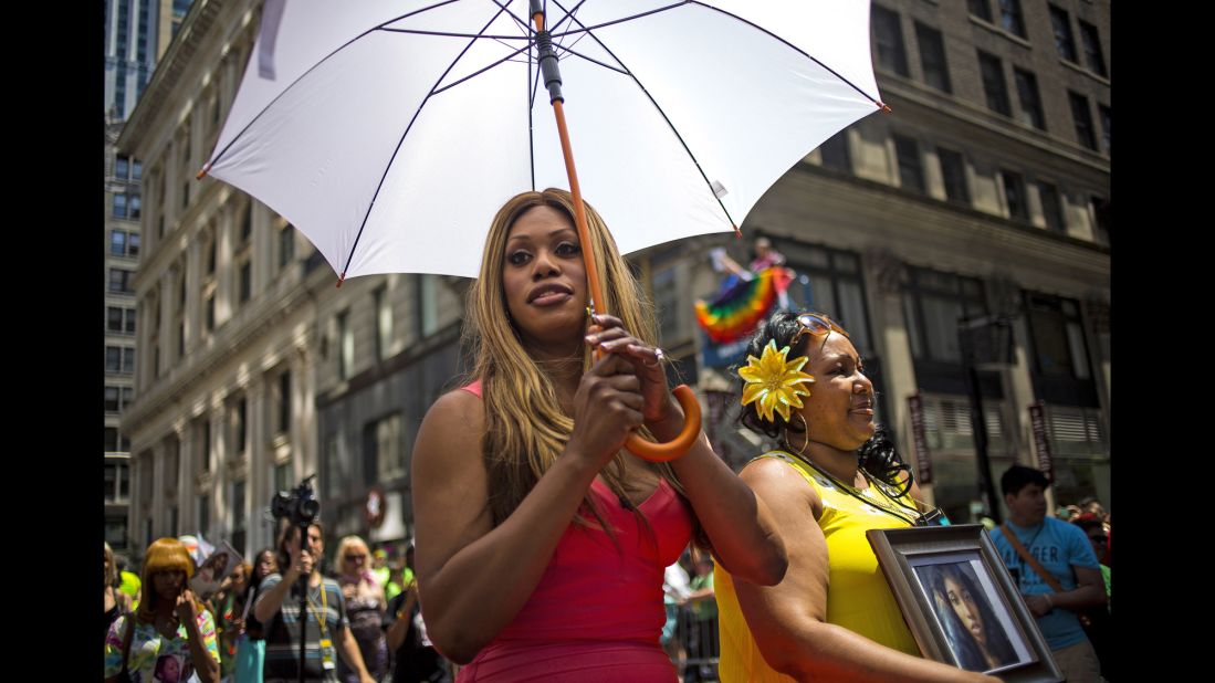 Grand Marshal Laverne Cox, left, and Delores Nettles, mother of <a href="http://www.cnn.com/2013/08/24/us/new-york-transgender-woman-death/">slain transgender woman Islan Nettles</a>, march in the parade.