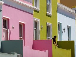 The colorful Bo Kaap district of Cape Town features vibrant houses like these.