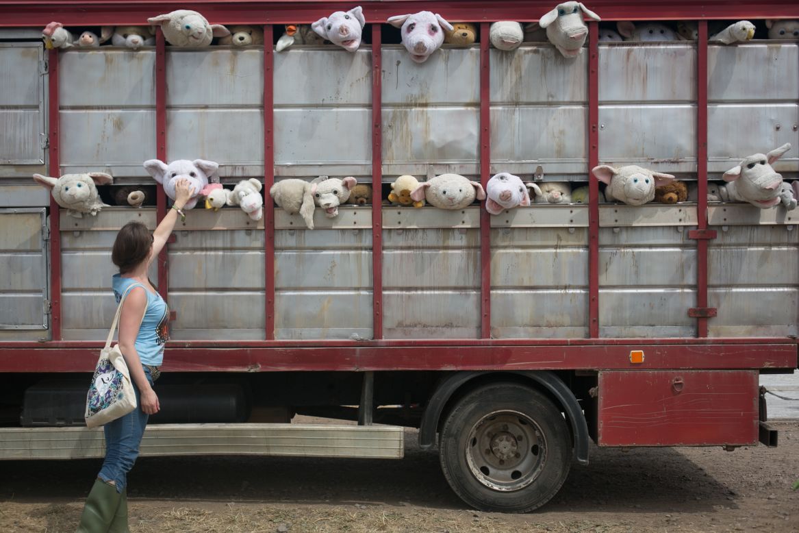 Local boy and acclaimed mystery artist Banksy made the UK debut of his mobile work<em> The Sirens of the Lambs</em>, depicting a truck full of shrieking cuddly animals being driven to slaughter.<br /> <br /> Asked for a comment, festival organizer Michael Eavis said: "Is it some kind of animal rights thing? I'm not sure about it. Our cows are actually very happy, they have the highest milk yield in the County."