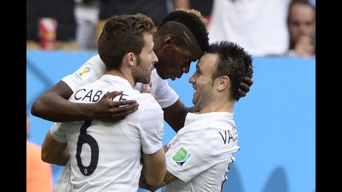 From left, French midfielders Yohan Cabaye, Paul Pogba and Mathieu Valbuena celebrate after Pogba's second-half goal opened the scoring.