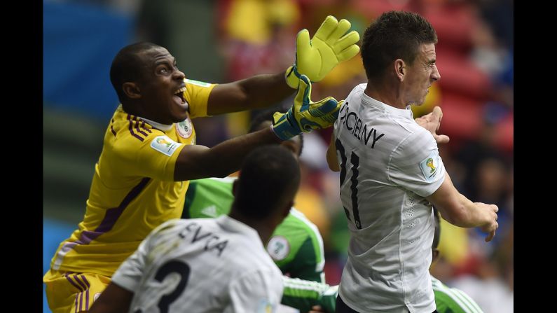 Koscielny and Enyeama compete for the ball.