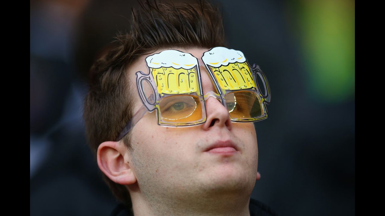 A fan looks on prior to the match between Germany and Algeria.