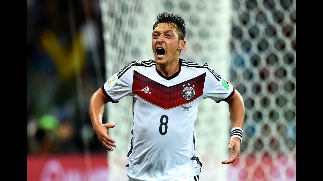 Mesut Oezil of Germany celebrates scoring his team's second goal.