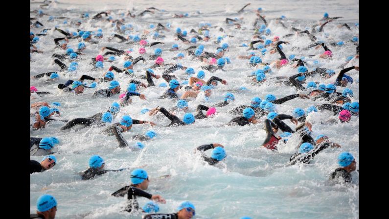 Athletes begin the swimming leg of the Ironman triathlon in Nice, France, on Sunday, June 29. The 2.4-mile swim was followed by a 112-mile bicycle ride and a 26.2-mile run.