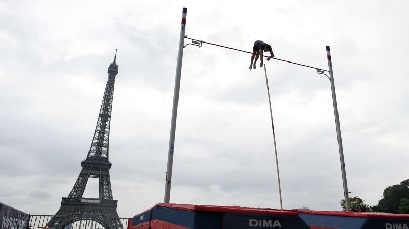 Olympic pole vault champion Renaud Lavillenie of France takes part in a pole vaulting exhibition Saturday, June 28, in Paris.