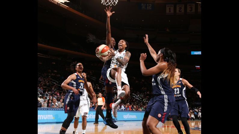 Cappie Pondexter of the New York Liberty drives the lane for a shot during a WNBA game against the Connecticut Sun on Sunday, June 29, in New York.