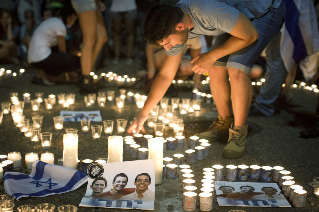 Israelis in Tel Aviv mourn the deaths of three teenagers.