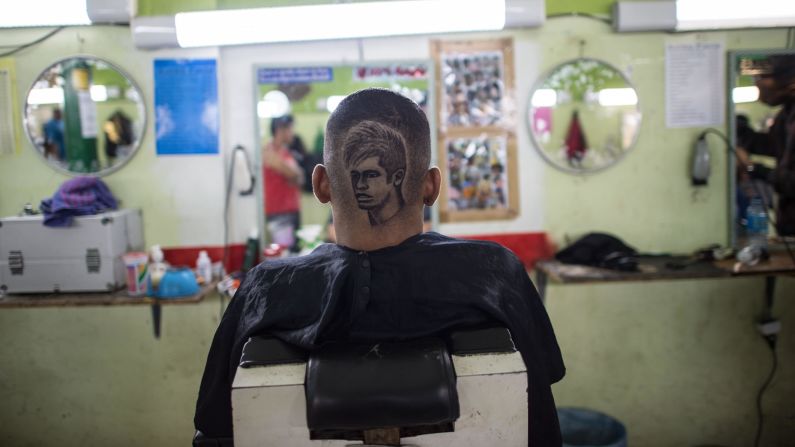 A man in Rio de Janeiro has a haircut of Brazilian soccer star Neymar on Friday, June 27. The haircut was made by Brazilian barber Marcelo Anderson Martins Ferreira.
