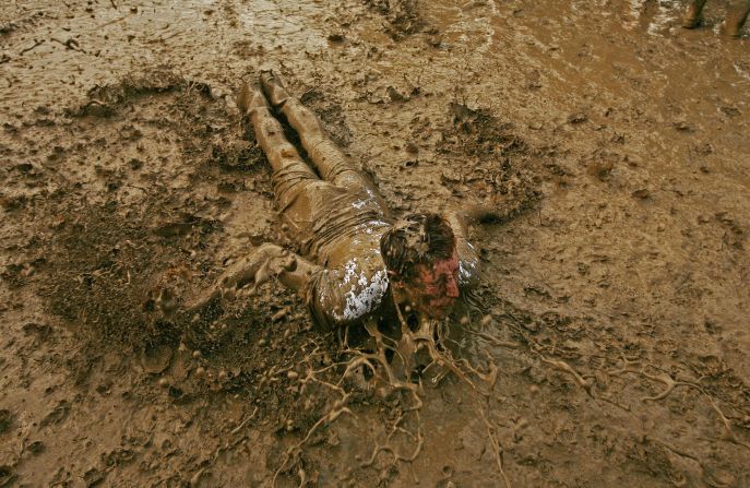 Our ancestors gave us sewers and hot, clean running water for what? So we could go roll around in mud at a music festival or pee behind a bush while camping?