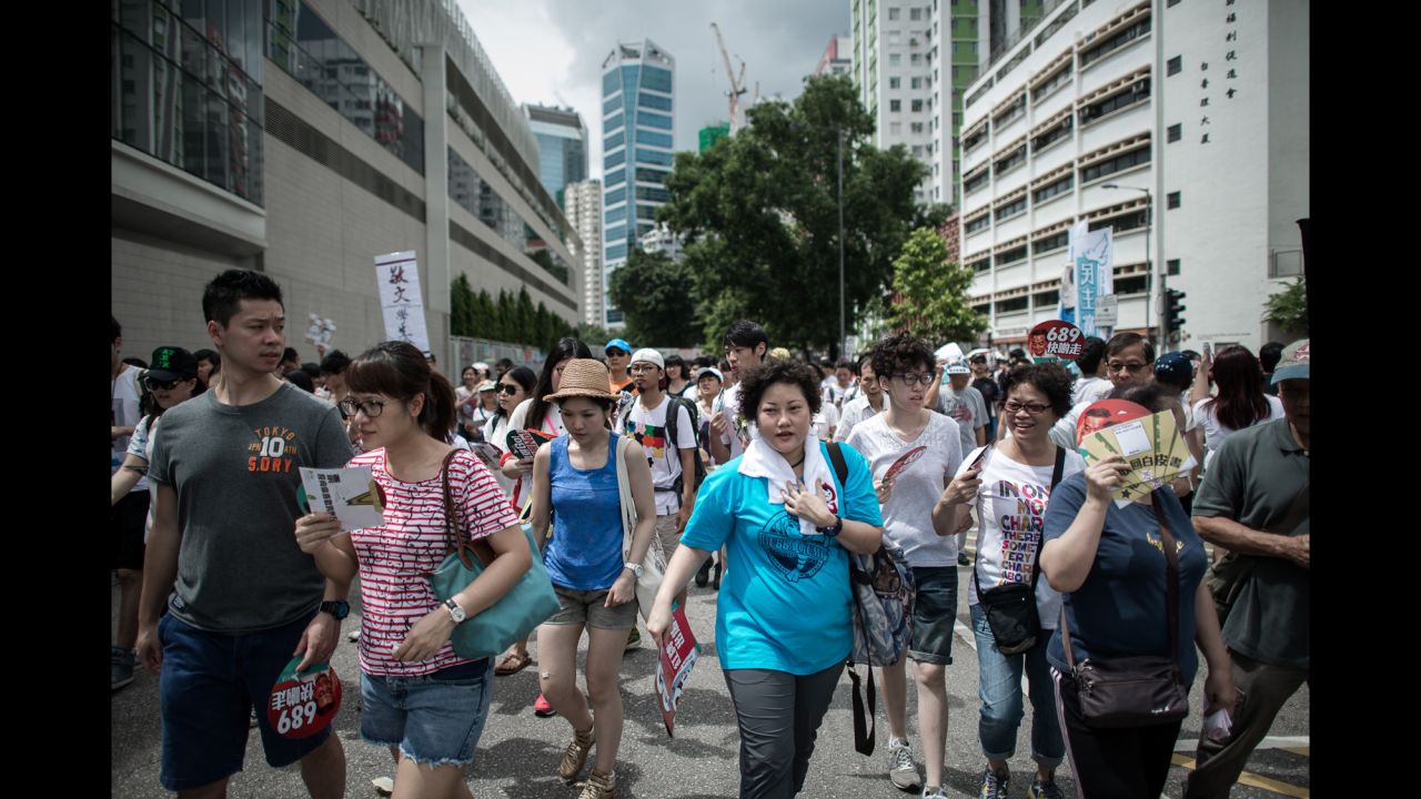 Demonstrators walked through downtown Hong Kong.
