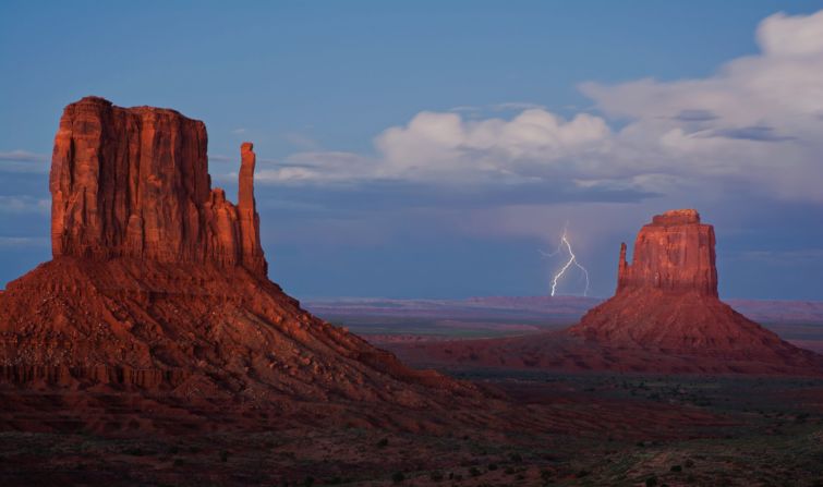 Monument Valley on the Arizona-Utah line is known for its sandstone formations and vast desert views.<a href="http://ireport.cnn.com/docs/DOC-1145480"> Toby Dingle</a> photographed lightning striking, "an amazing thing to witness," last September. 