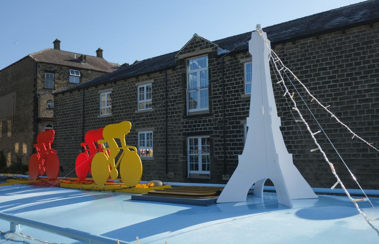 Canal boats at the Skipton Waterway Festival in England are decorated in honor of this year's Tour de France. 