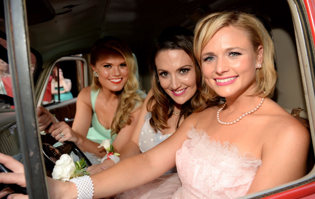 Miranda Lambert is celebrating the success of her album "Platinum" with a new look. The singer, far right, showed off a cropped haircut June 30 at a party celebrating her hit song "Automatic" going No. 1. To her right are "Automatic" co-writers Natalie Hemby and Nicolle Galyon.