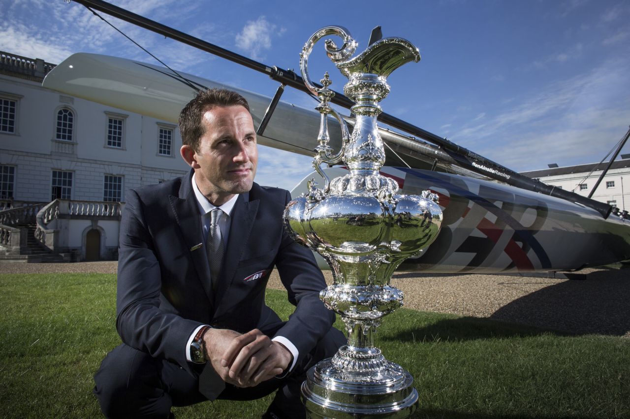 Ainslie poses with the America's Cup outside London's Maritime Museum. Britain has never won the coveted trophy despite hosting the first ever edition of the event in 1851.