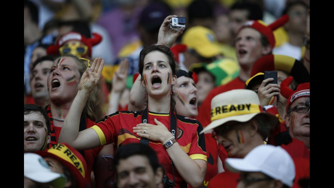 Belgium supporters cheer for their team.