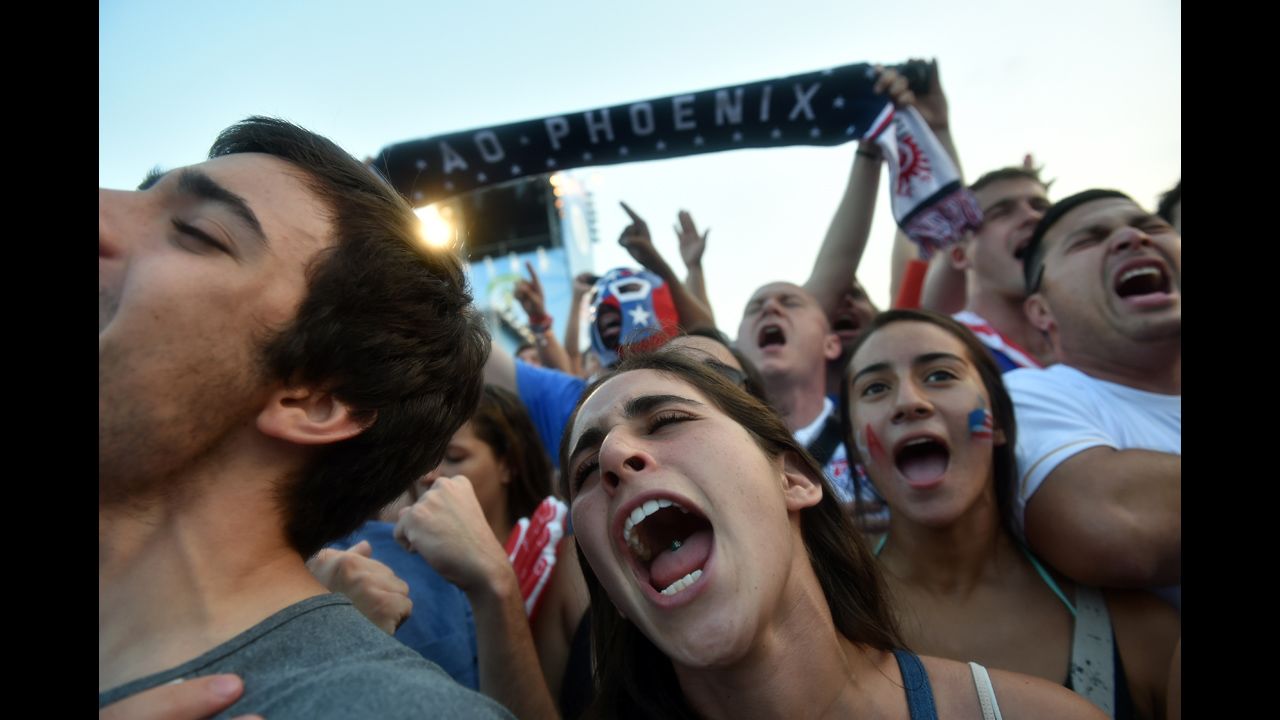 U.S. fans react as they gather to watch the match at Copacabana beach in Rio de Janeiro.