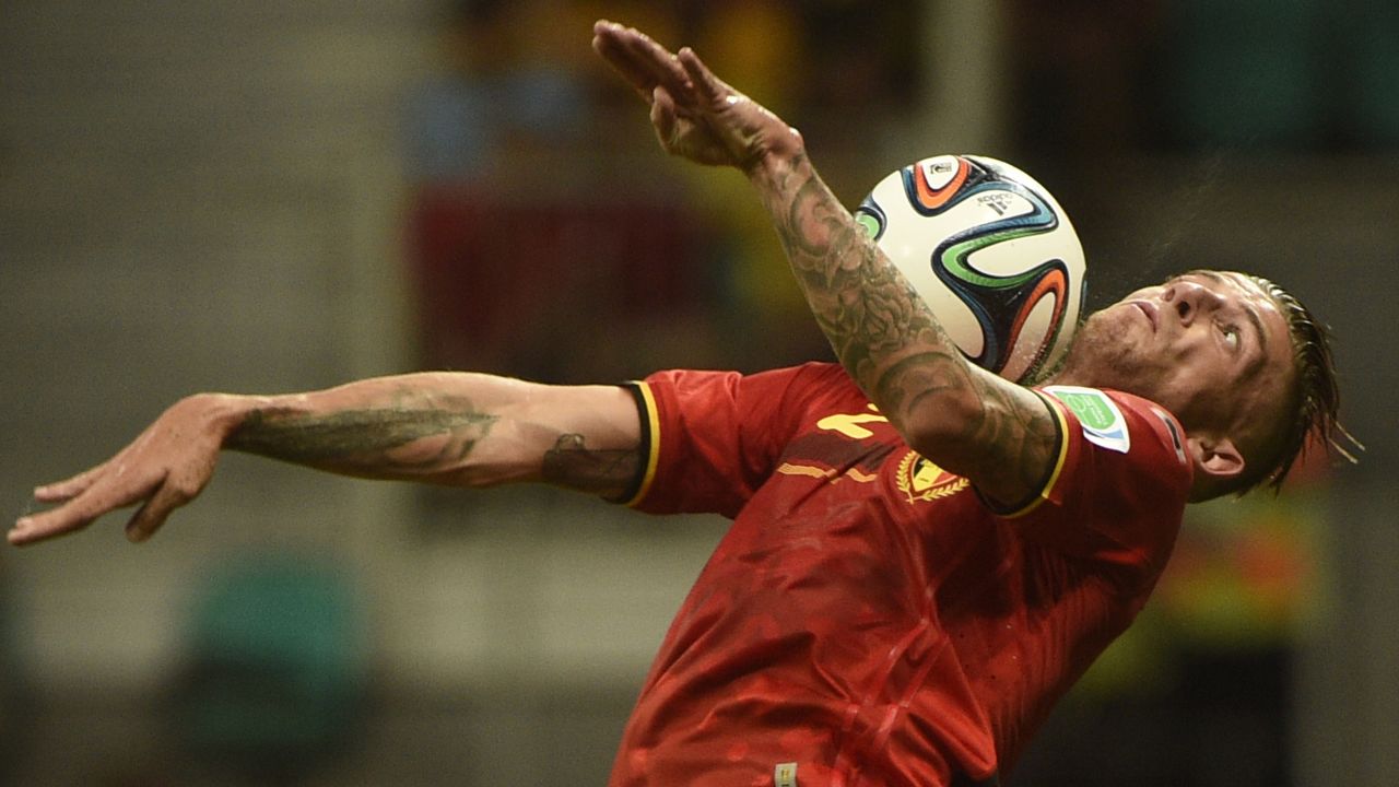 Belgium defender Toby Alderweireld controls the ball on his chest.