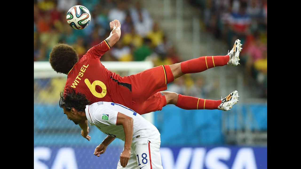 Witsel lands on Wondolowski while competing for the ball.
