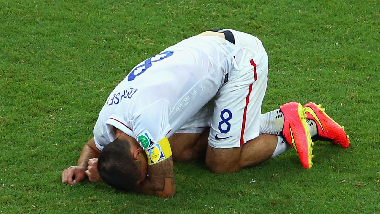 SALVADOR, BRAZIL - JULY 01: Clint Dempsey of the United States lies on the field during the 2014 FIFA World Cup Brazil Round of 16 match between Belgium and the United States at Arena Fonte Nova on July 1, 2014 in Salvador, Brazil. (Photo by Robert Cianflone/Getty Images)