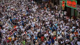 A river of protesters wearing pro-democracy white T-shirts flows through Hong Kong's Causeway Bay. According to many organizers on the scene, the protest was one of the largest in recent memory.