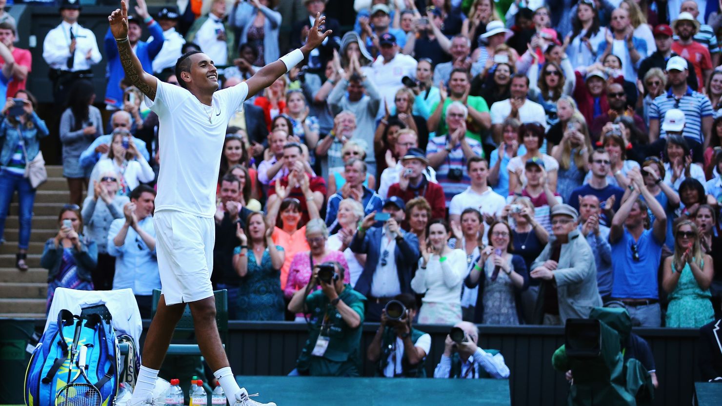 Australia's Nick Kyrgios celebrates after winning his fourth round match against Rafael Nadal at Wimbledon.