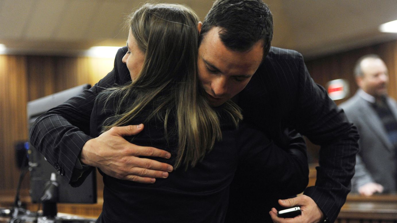 Pistorius hugs a supporter Wednesday, July 2.