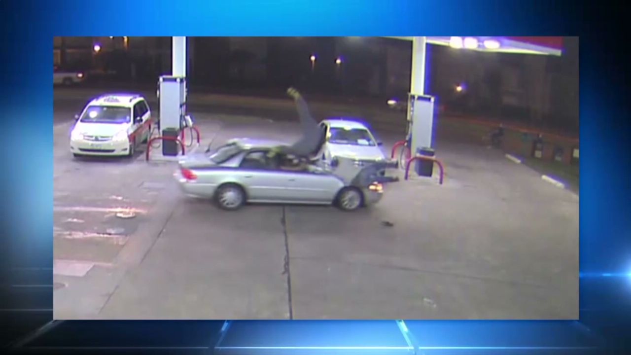 Woman runs over men at gas station