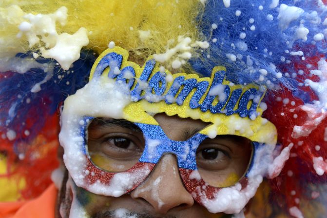 Fans of 'los cafeteros' in Medellin, Colombia, get behind their team as they make an appearance at the World Cup for the first time since 1998. 