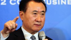 This picture taken on December 12, 2012 shows Wang Jianlin, head of conglomerate Wanda Group -- a private firm with interests ranging from property to retailing -- attending a press conference in Beijing. Wang, a multi-billionaire who bought US cinema chain AMC Entertainment and has just acquired a luxury British yacht builder, has taken top spot as China's richest man with a wealth of 14 billion USD, according to Forbes magazine. CHINA OUT AFP PHOTOSTR/AFP/Getty Images