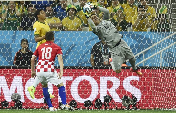 Julio Cesar makes a fantastic save to keep Croatian forward Olic from putting the ball into the back of the net in the opening game of the 2014 World Cup