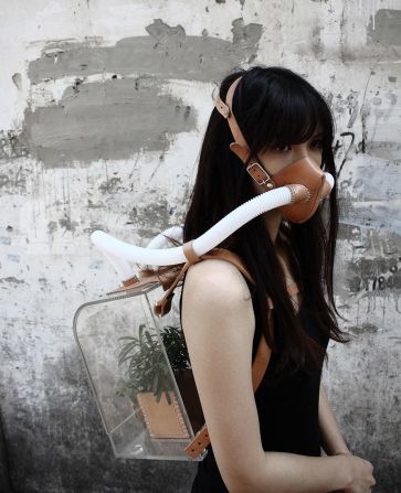 Artists have come up with their own take on the problem. Chiu Chih has designed a a bold, abstract take on an oxygen tank -- a potted plant inside a clear backpack hooked up to two tubes to funnel fresh air into a face mask.