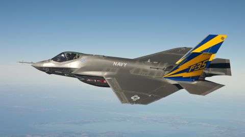 A F-35C conducts a test flight over the Chesapeake Bay on February 11, 2011. Inspections of F-35 engines have been ordered after a runway fire at Eglin Air Force Base on June 23. The F-35 Lightning II has been beset by delays and cost overruns in the years since its introduction.