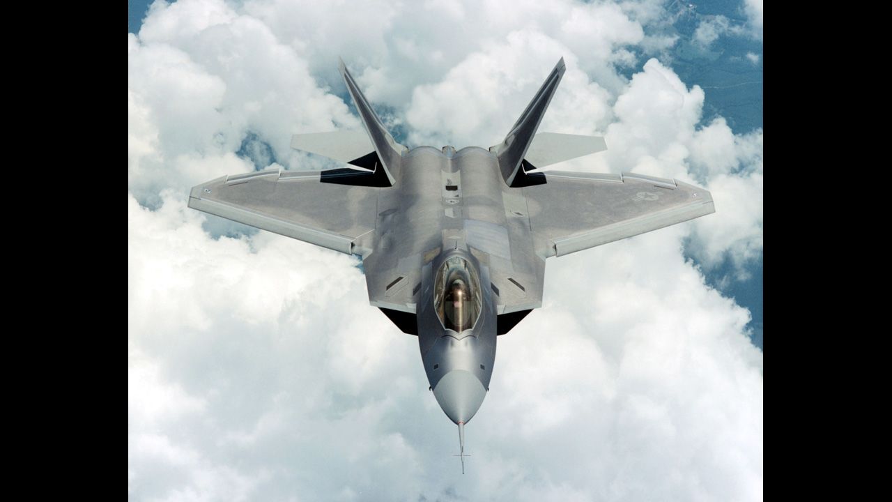 A F-22 Raptor flies over Marietta, Georgia, home of the Lockheed Martin plant where it was built. The F-22 is the only fighter capable of simultaneously conducting air-to-air and air-to-ground combat missions.