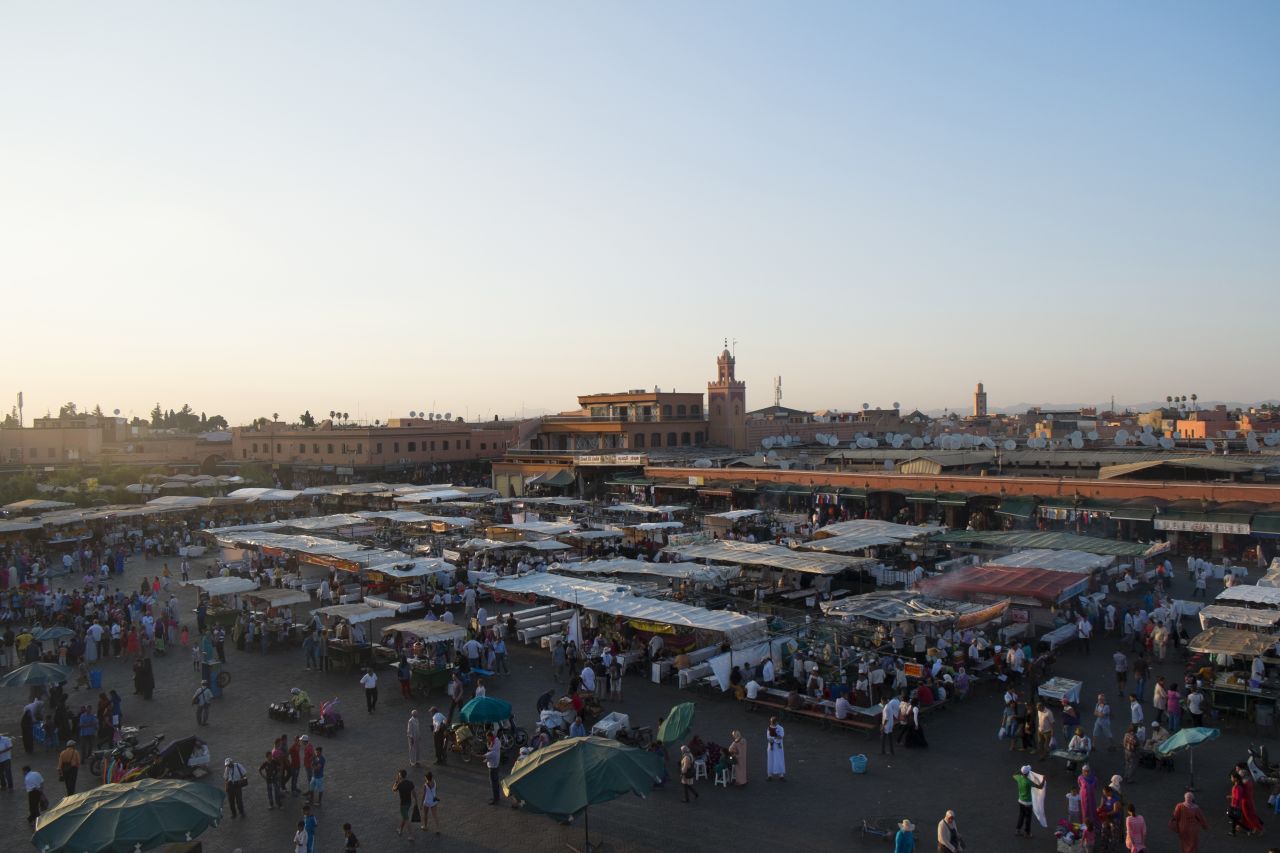 In the evening, the square is alive with musicians and traders. One, who calls himself "Denzil Washington," attracts tourists by calling to them in a faux cockney accent.