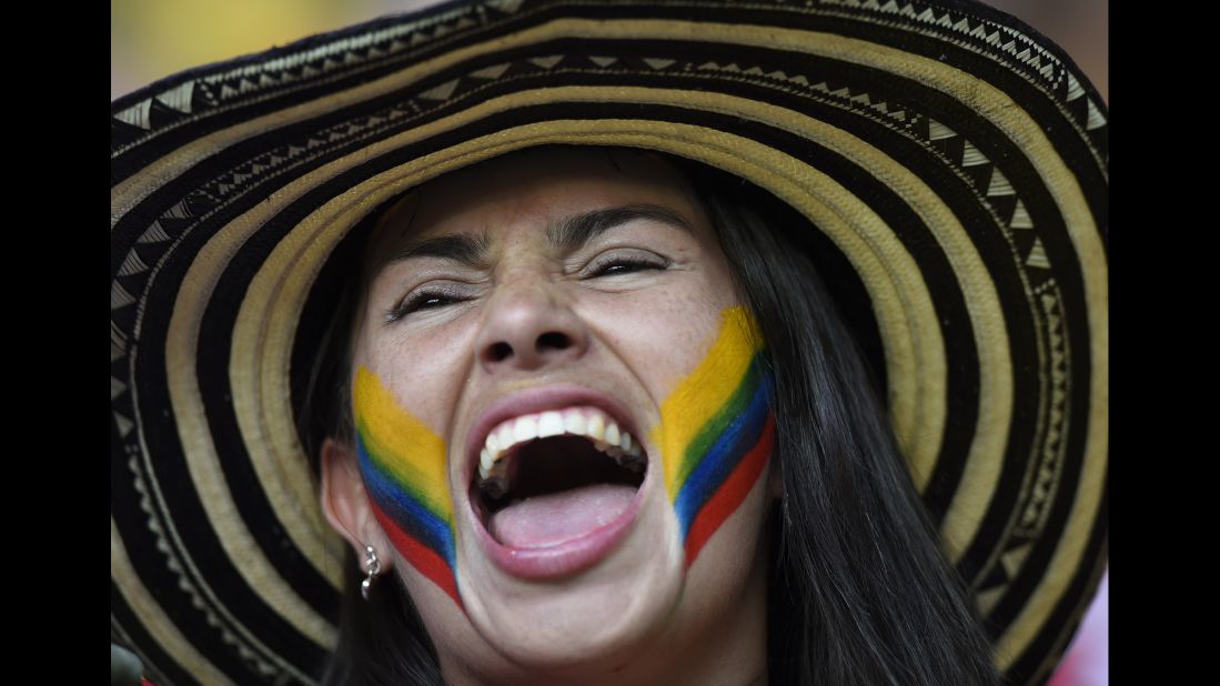 A Colombia supporter cheers prior to the game. 
