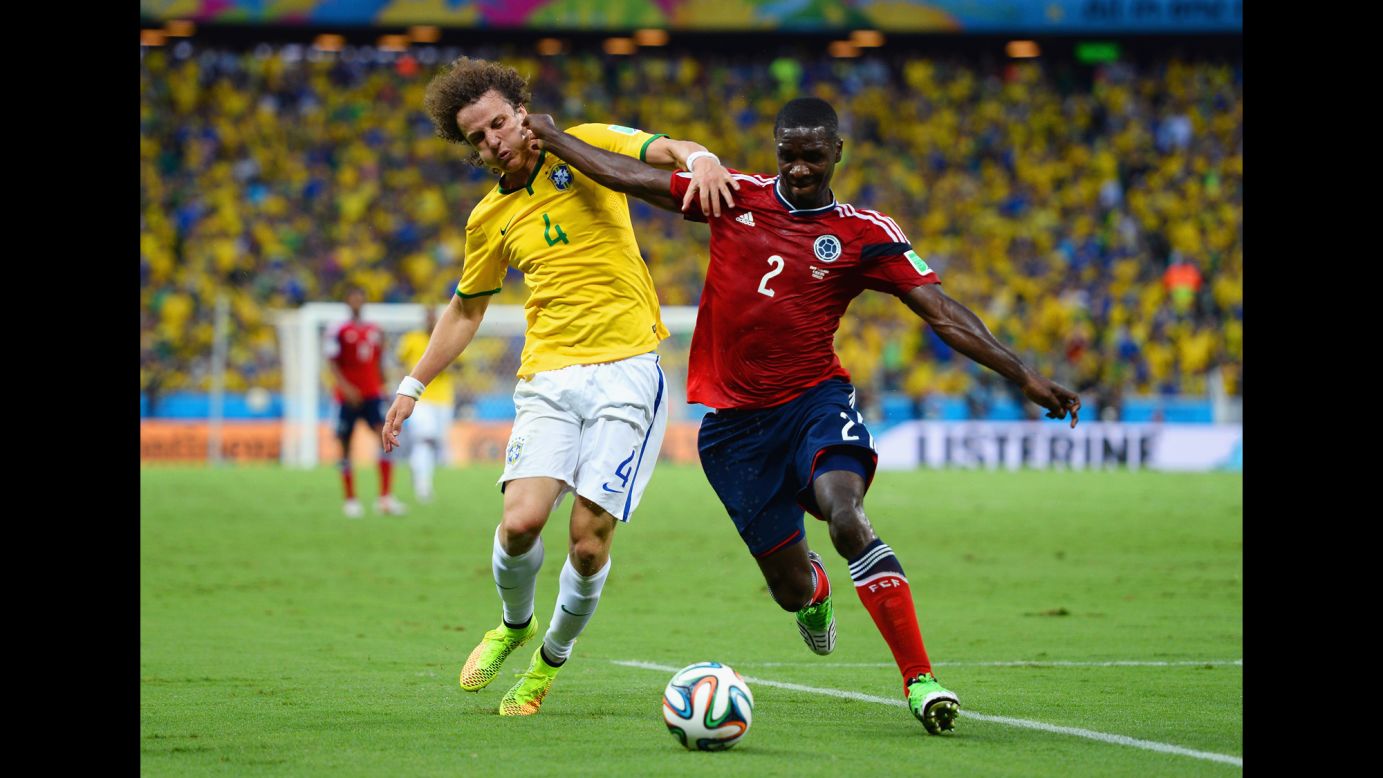 David Luiz, left, and Colombia's Cristian Zapata compete for the ball. 