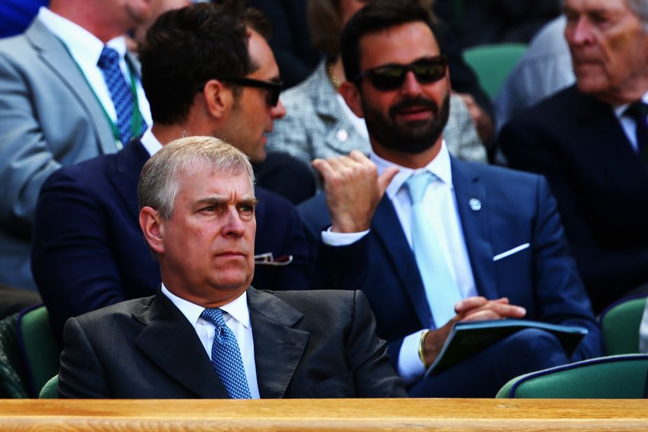 Prince Andrew graces Centre Court with is royal presence, although he looks less than impressed.