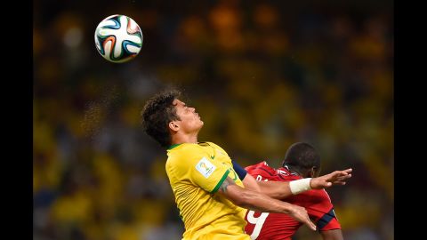 Thiago Silva fights for a header near Colombian forward Teofilo Gutierrez.