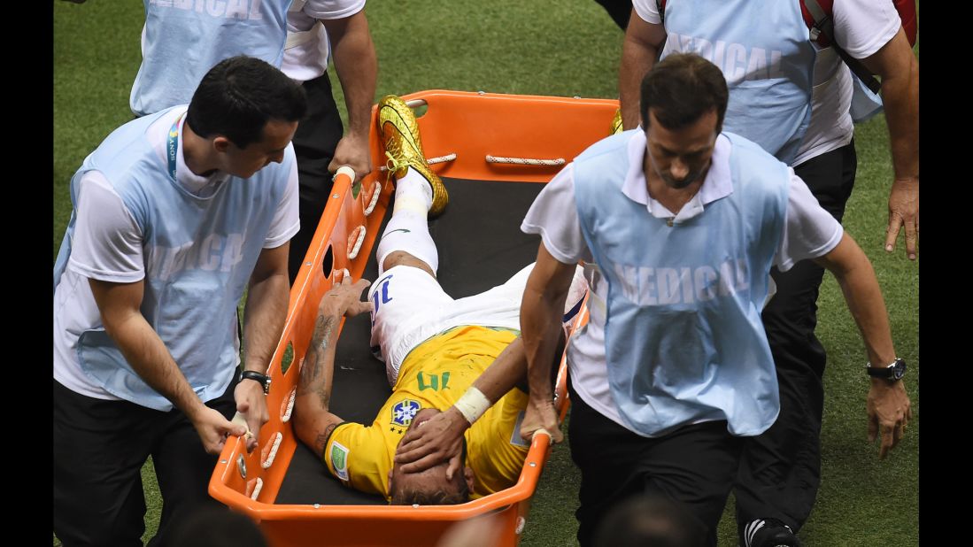 Neymar is carried on a stretcher after being injured following a tackle during the quarterfinal against Colombia at the Castelao Stadium in Fortaleza during the 2014 World Cup.