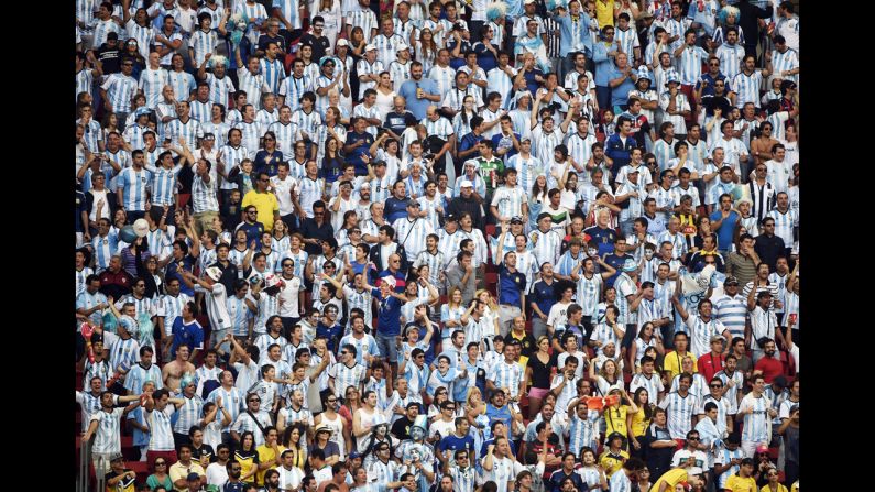 Argentina fans cheer during the match against Belgium at the Mané Garrincha National Stadium.