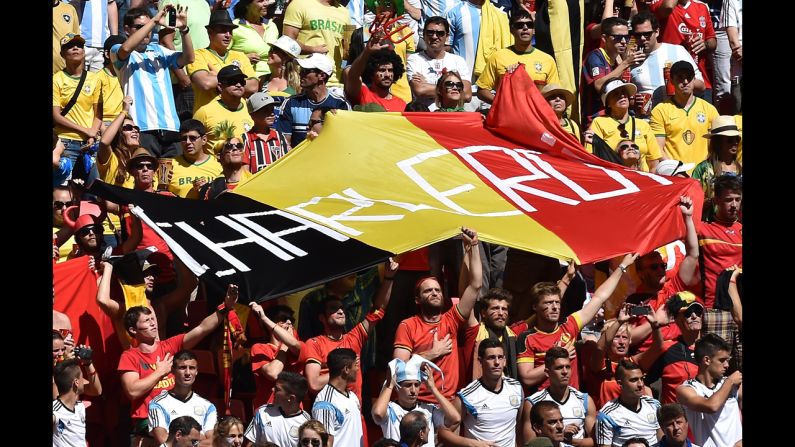 Belgium fans hold up a huge flag before the match against Argentina. <a href="index.php?page=&url=http%3A%2F%2Fwww.cnn.com%2F2014%2F07%2F04%2Ffootball%2Fgallery%2Fworld-cup-0704%2Findex.html">See the best World Cup photos from July 4. </a>