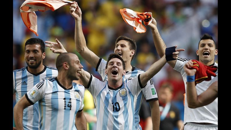 Argentina forward and captain Lionel Messi, center, celebrates with teammates after winning their quarterfinal match against Belgium on July 5.