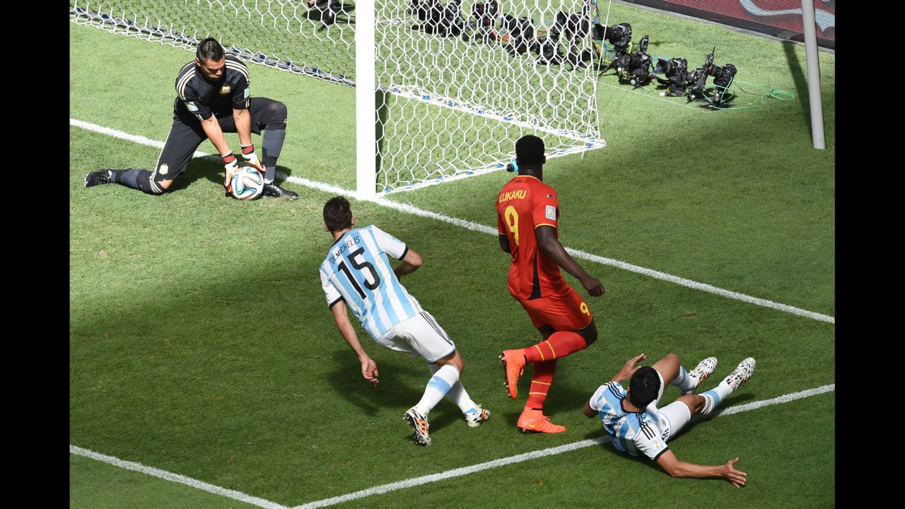 Argentina goalkeeper Sergio Romero, left, makes a save. 
