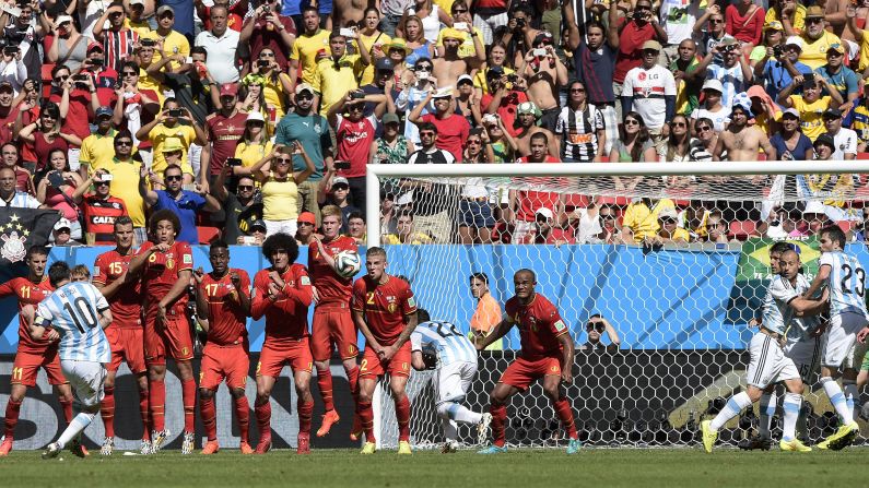 Messi attempts a free kick.