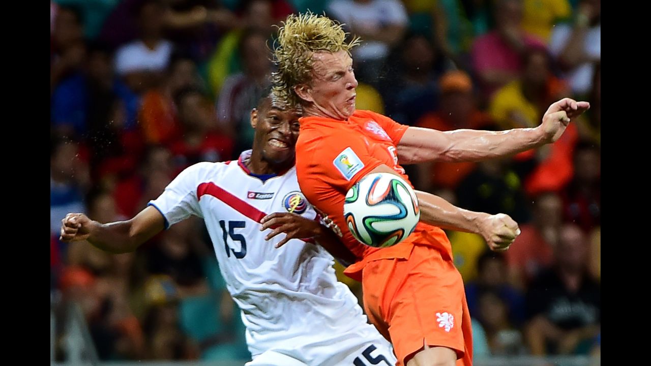Costa Rica defender Junior Diaz, left, and Netherlands forward Jeremain Lens vie for the ball. 